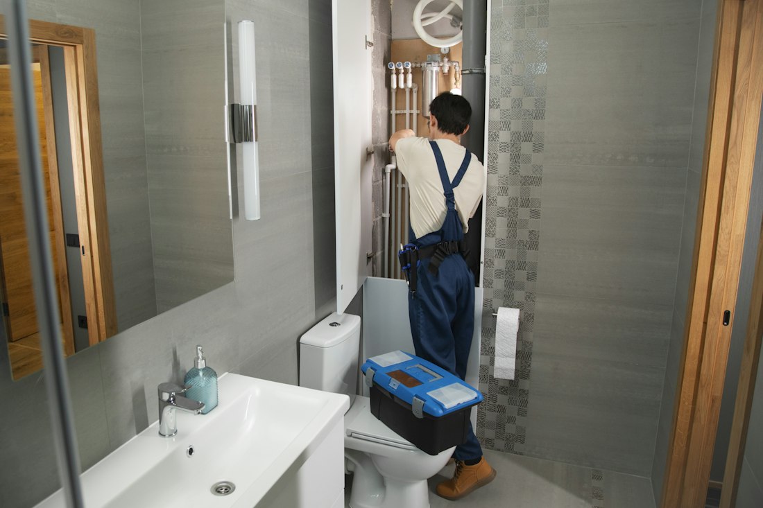 Capitol City plumber arriving at a bathroom job